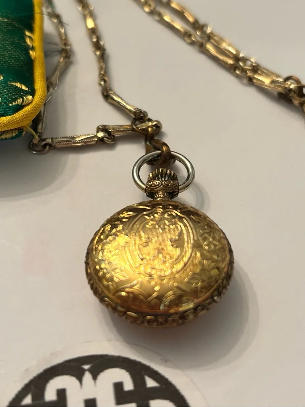 Art Nouveau Style Filigree Pocket Watch Necklace with matching antique chain.